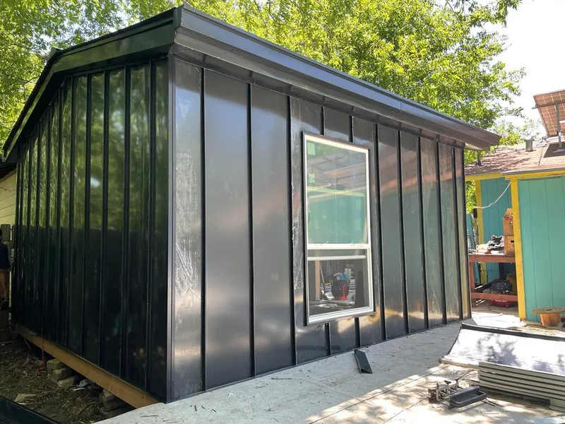 Black standing seam metal wall panels for Metal Roof Installation in Mitchell