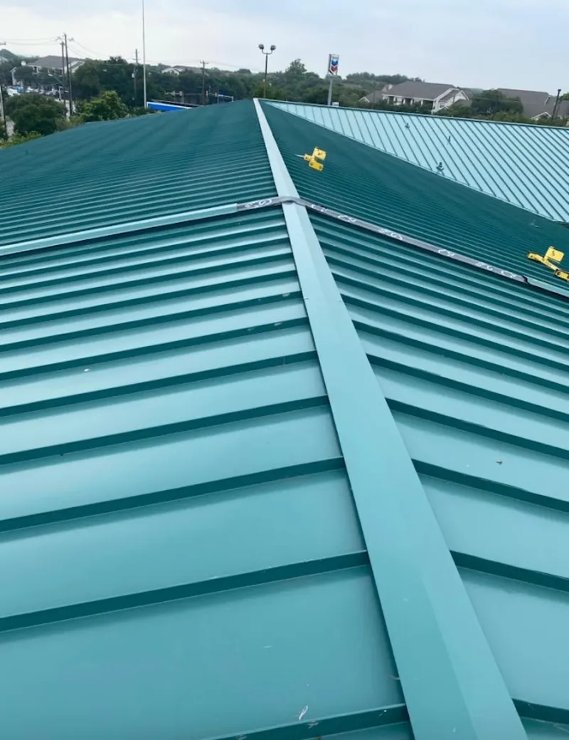 Green commercial metal roof ridge and valley for Metal Roof Repair in Mitchell