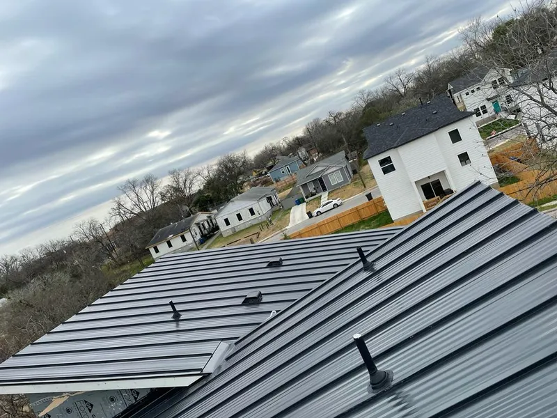 Standing seam metal roof panels with vents for Skylight Repair in Mitchell